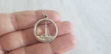 Load image into Gallery viewer, Vintage sterling silver 925 charm for charm bracelet of Toronto Ontario Canada skyline with CN Tower and Lake Ontario, sold by Gray Barn Eclectic Find vintage online store, charm held in hand to show detail
