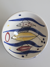 Load image into Gallery viewer, Stavangerflint Norway 1950s 1960s MCM atomic midcentury pottery with red yellow and blue fishes in cobalt blue waves, Gray Barn Eclectic Finds online vintage store, small asymmetrical bowl 87mm diameter 