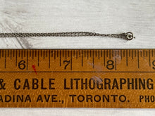 Load image into Gallery viewer, close up of the necklace closure on the vintage silver cross, showing a hoop and bar fastener, along with the length of about 17&quot;