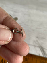 Load image into Gallery viewer, a close up of the ring and bar closure on the silver chain necklace (there is no way for the pendant to slip  off the chain easily with this type of closure)