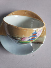 Load image into Gallery viewer, Vintage 1950s 1960s Lustrewear Lusterwear Japanese Tea Cup and Saucer,  Orange, Pale Blue, Pagoda, Cherry Blossoms, Cherry Trees, Japan